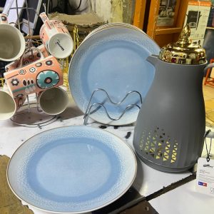 6 pcs blue ceramic plates , 6 pcs orange/white mugs and grey gold flask